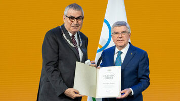 Prof Dr Erdener receives his Olympic Order in Olympia.