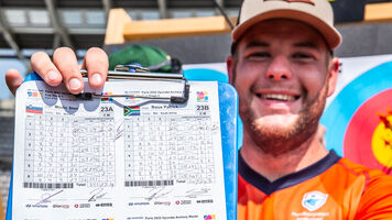 Mike Schloesser and a scoresheet.