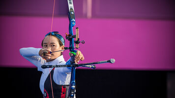 Karma shoots at the Tokyo 2020 Olympic Games.