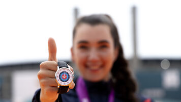 Marie Horackova shows off her SNGLRTY watch.