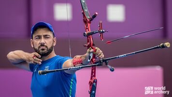 Mauro Nespoli shoots at the Tokyo 2020 Olympic Games. 