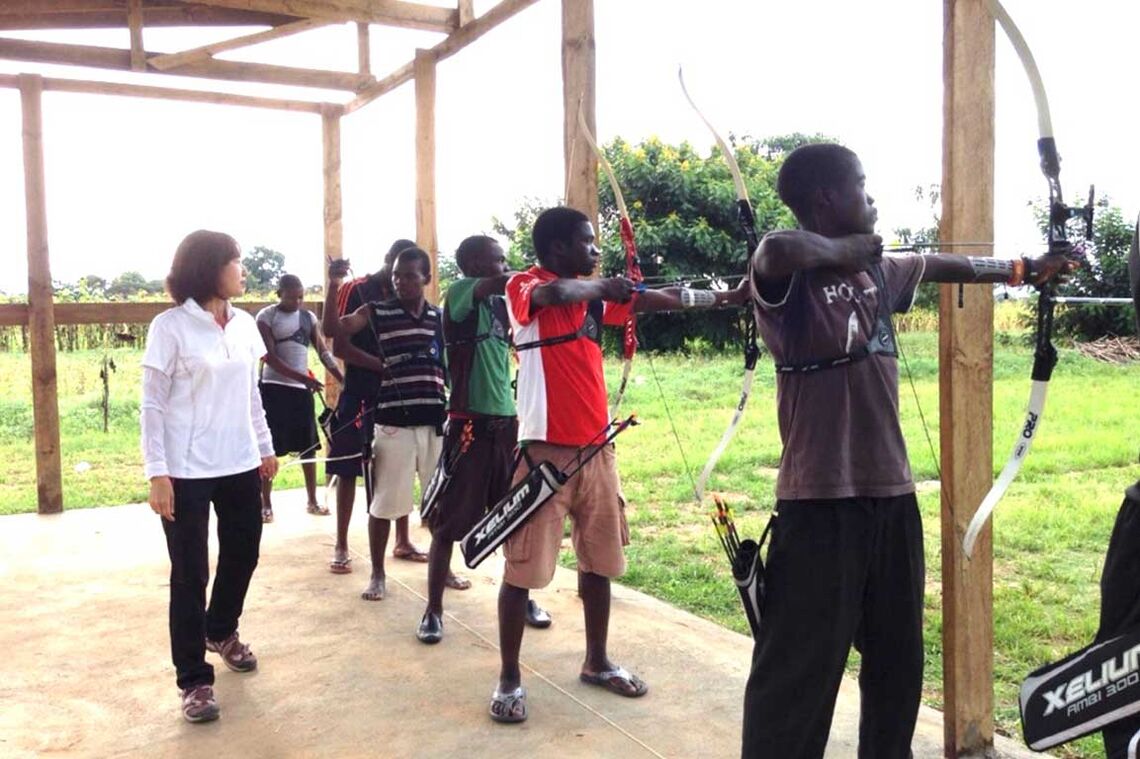 Sally coaching archers in Gumulira, Malawi.