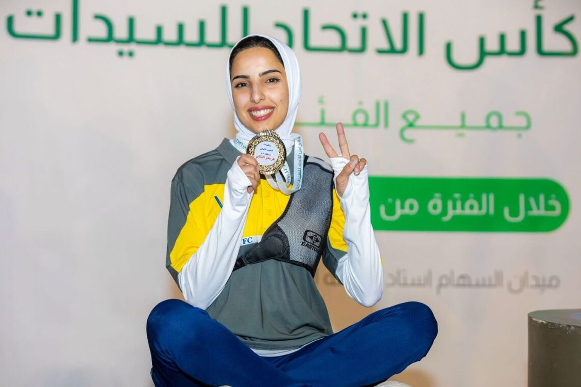 Mashail Alotaibi with medal.