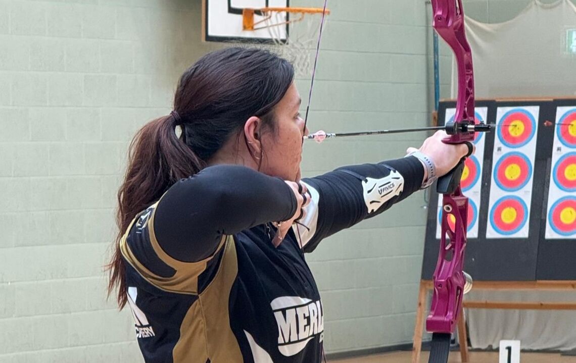 Illaria Knibb shooting indoors.