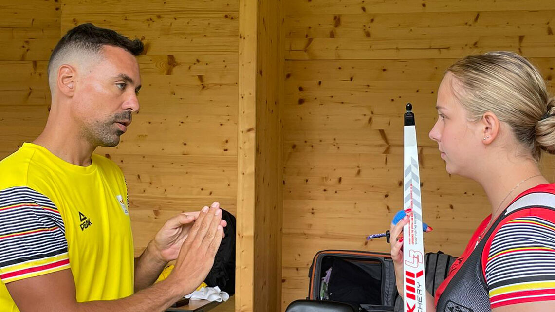 Nicolas Rifaut giving instruction to Belgian archer.